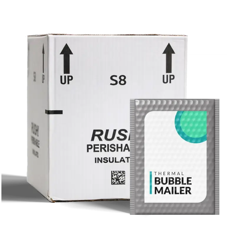 An insulated bubble mailer in front of a cold shipping box. 